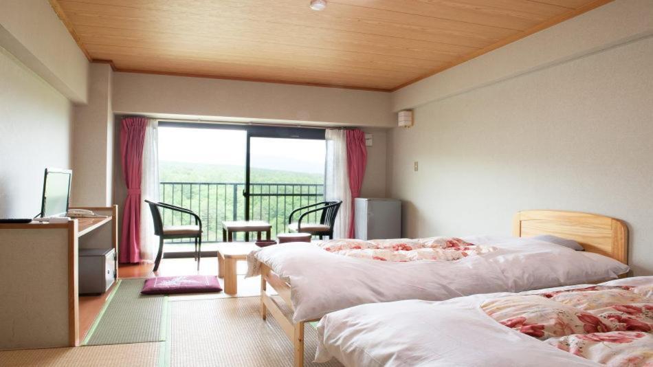 Hotel New Koyo Кусацу Экстерьер фото