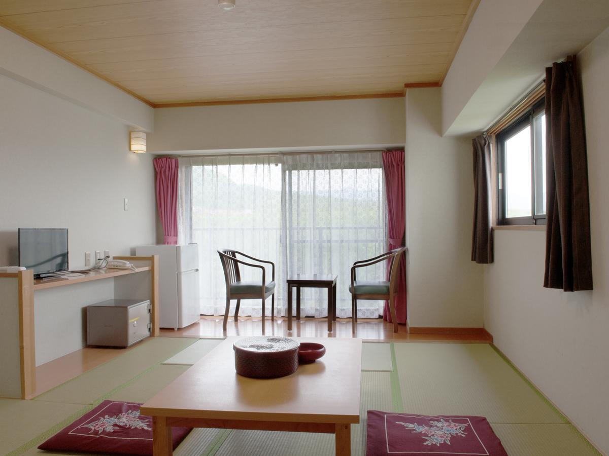 Hotel New Koyo Кусацу Экстерьер фото