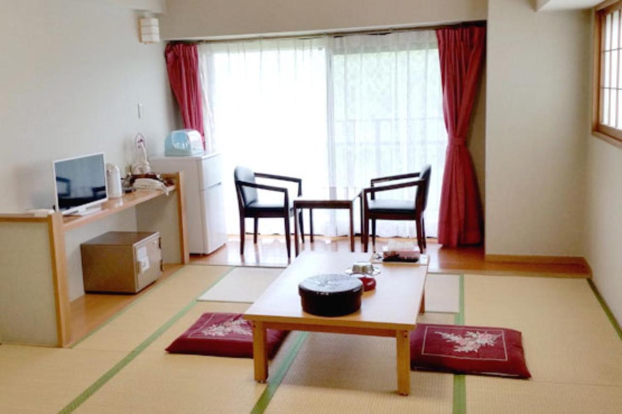 Hotel New Koyo Кусацу Экстерьер фото